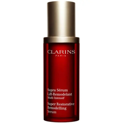 Clarins Super Restorative Remodelling Serum 30ml in a clear glass bottle with a pump, displayed on a neutral background.