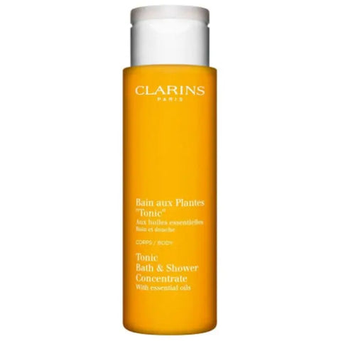 Clarins Tonic Bath and Shower Concentrate in 200ml bottle, featuring a sleek design with the product label visible.