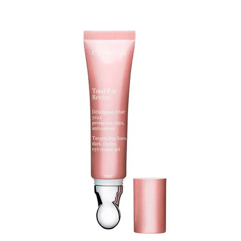 Clarins Total Eye Revive 15ml eye treatment jar with applicator, featuring a sleek container and fresh product inside.