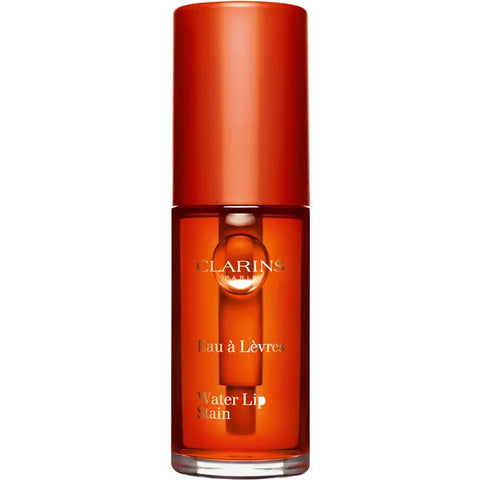 Clarins Water Lip Stain in 02 Orange Water, a vibrant liquid lipstick with a refreshing orange hue, by Jag Couture London New York.