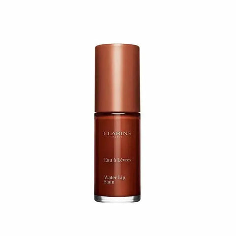 Clarins Water Lip Stain in 12 Mocha Water, showcasing a natural lip look with a hint of mocha color, held by hand.