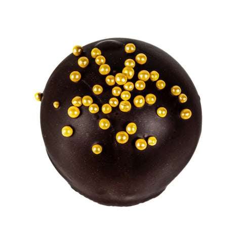 Cointreau-flavored truffle balls with oatmilk ganache coated in dark chocolate, from Jag Couture London New York, 12.8g.