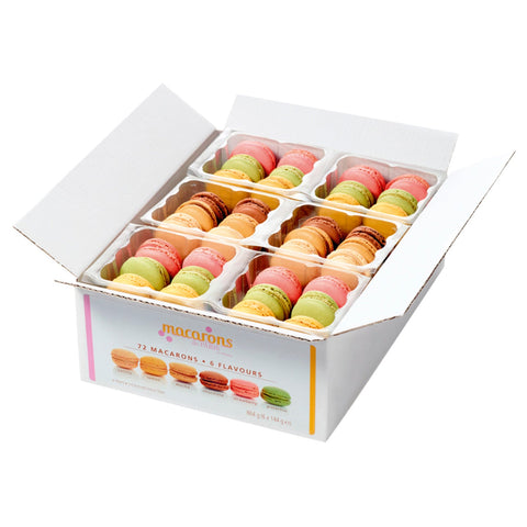 Assorted mixed macarons with six flavors in a box, featuring colorful, delicate French-style treats from Jag Couture London - New York.