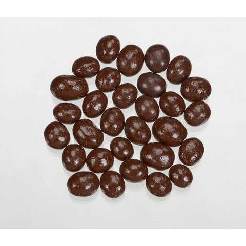 Dark chocolate covered coffee beans by Jag Couture London New York, showing glossy chocolate coating on coffee beans.