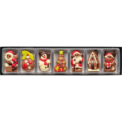 Decorated solid milk chocolate Christmas caraques in a 300mm finger box by Jag Couture London New York.