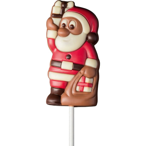 Decorated solid milk chocolate Santa with present lolly, 165mm, by Jag Couture London and New York, displayed in a festive setting.
