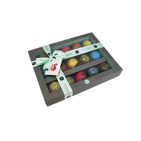 Deluxe gift box of 15 Picasso chocolates by Jag Couture London - New York with a menu tag, showcasing an elegant assortment of chocolates.