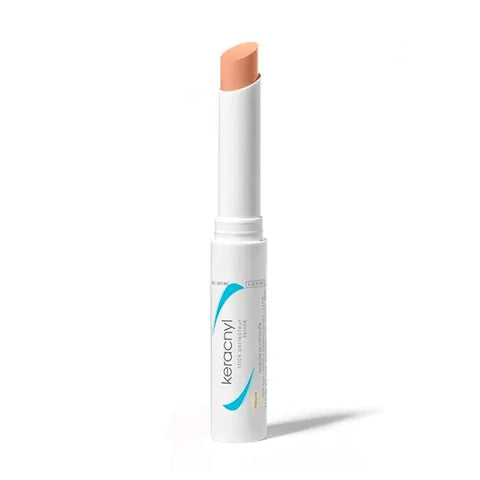 Ducray Kerancyl Stick Corrector 2.15g, a skincare product with a white stick and beige cap, designed for skin correction.