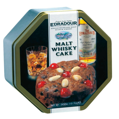 Edradour malt whisky flavoured cake in an octagonal tin by Jag Couture London, featuring detailed packaging and branding.