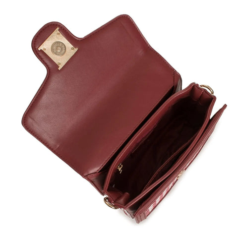 Egon Von Furstenberg Alison handbag in black leather with gold hardware, featuring structured design and top handle.