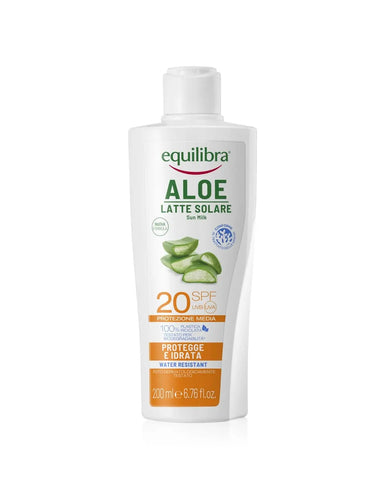 Equilibra Sun Aloe Pro UV F20 cream in 200ml jar, shown with sun and aloe vera leaves, by Jag Couture London New York