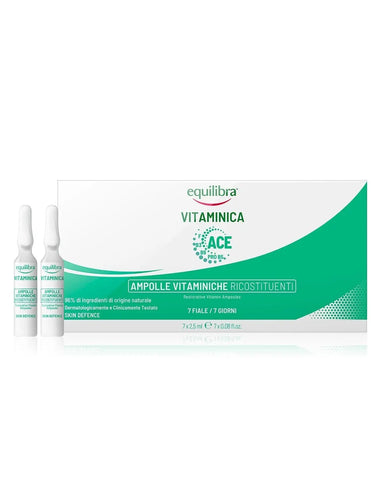 Equilibra Vit Restorat Vitamin Ampoules by Jag Couture London New York, showing a set of small glass ampoules with bright liquid inside.