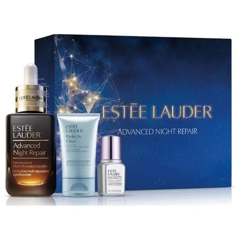 Estée Lauder Advanced Night Repair set with three skincare products, displayed with elegant packaging and branding.