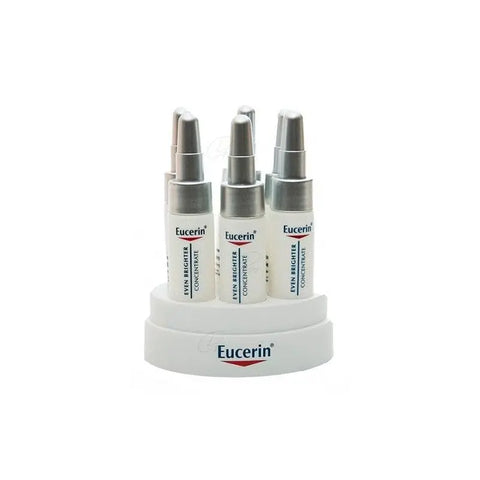 Eucerin Even Brighter Concentrado 6 Ampollas with B-Resorcinol for dark spot reduction, displayed in glass ampoules.