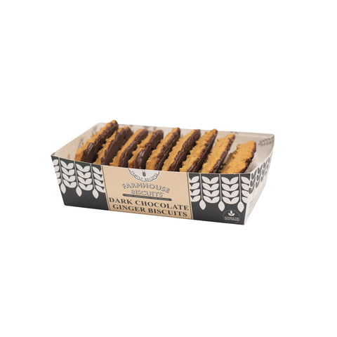 Dark chocolate ginger biscuits from Jag Couture London in a tray, showcasing rich chocolate and spicy ginger pieces.