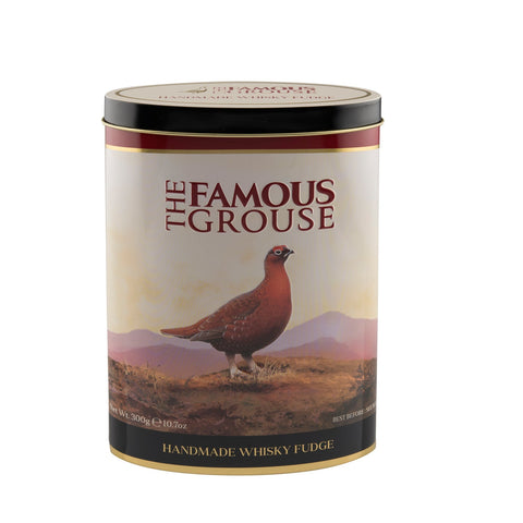 Famous Grouse whisky flavored fudge in a decorative tin by Jag Couture London New York, showcasing the fudge pieces inside.