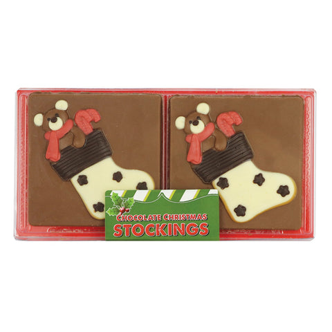 Hand-decorated chocolate Christmas teddy stocking in acetate pack by Jag Couture London New York, featuring festive holiday design.