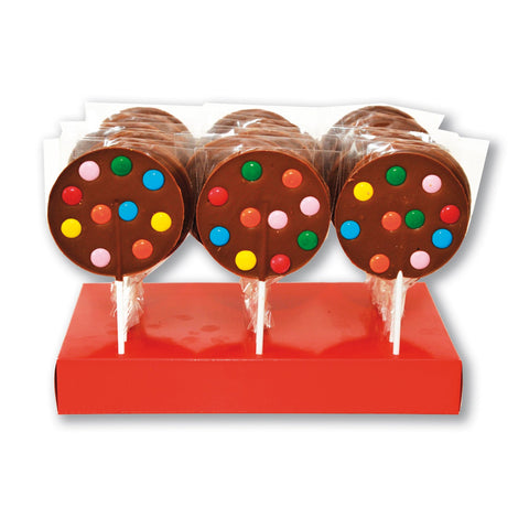 Milk chocolate lollipops with bean accents from Jag Couture London - New York, shown on a white background.