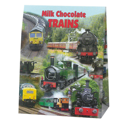 Milk chocolate trains in gift pack by Jag Couture London - New York, featuring detailed train-shaped chocolates arranged in a festive display.
