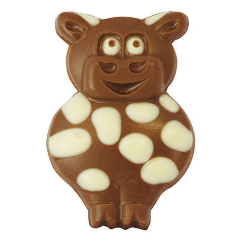 Decorated solid milk chocolate Matilda the cow by Jag Couture London, featuring detailed chocolate cow figures, approx 35 pieces.