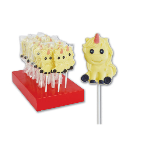 Hand-decorated white chocolate unicorn lollipops from Jag Couture London-New York displayed in a collection.