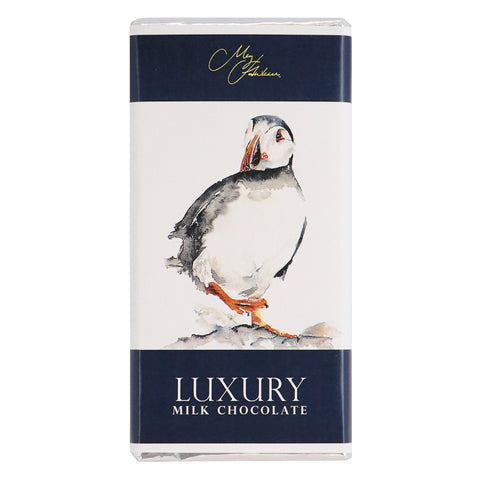 Milk chocolate bar featuring Meg Hawkins Puffin design by Jag Couture London New York, with colorful puffin artwork on the packaging.