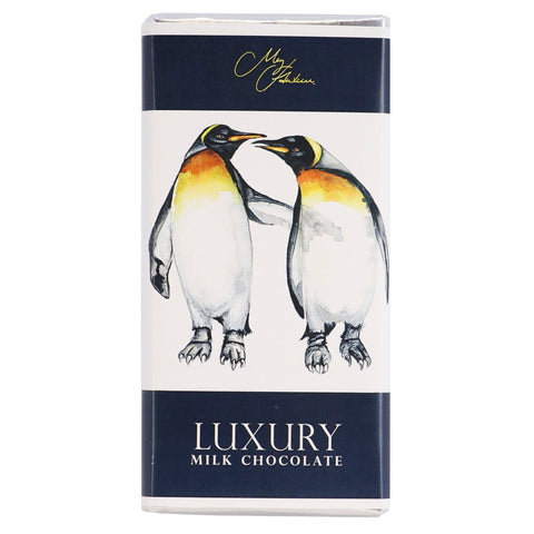 Milk chocolate bar with Meg Hawkins penguin design by Jag Couture London New York, featuring detailed penguin artwork on the packaging.