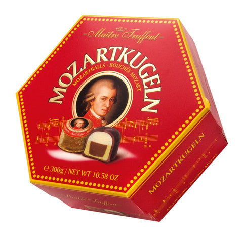Jag Couture London New York Mozart Kugeln box with milk and dark chocolate bonbons filled with pistachio marzipan, praline, and hazelnut.
