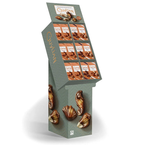 Guylian Luxe gift box with seashells, dark seashells, and Opus chocolates on a floorstand, by Jag Couture London New York.