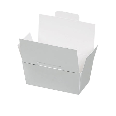 Bright silver ballotin with lock top from Jag Couture London - New York, shown with two elegant chocolate boxes.