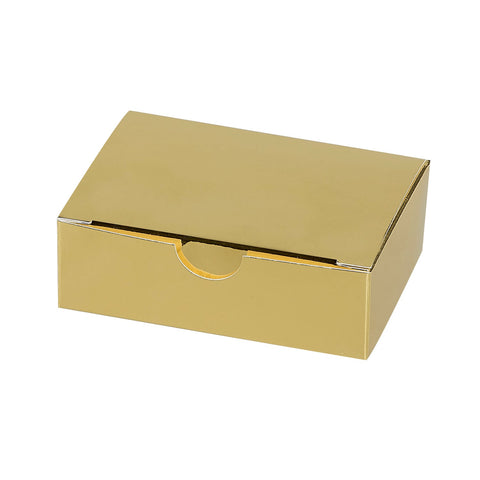 Shiny gold 6-chocolate box with locking top by Jag Couture London New York, featuring a sleek, reflective surface.