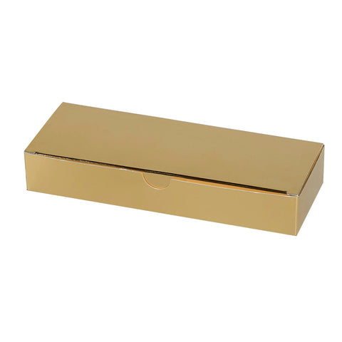 Shiny gold 12-chocolate box with locking top by Jag Couture London - New York, displayed on a reflective surface.