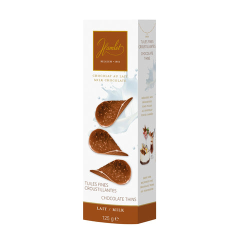 Hamlet milk chocolate thins by Jag Couture London - New York, showing thin, smooth milk chocolate pieces on a white background.