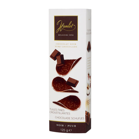 Hamlet dark chocolate thins by Jag Couture London - New York, close-up of thin, glossy dark chocolate pieces on a white background.