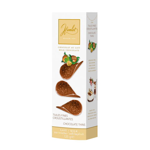 Hamlet milk hazelnut chocolate thins by Jag Couture London - New York, showcasing thin, smooth milk chocolate with hazelnut pieces.