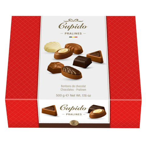 Assorted chocolates in a Cupido carton by Jag Couture London - New York, featuring a variety of chocolates arranged in a decorative box.