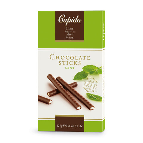 Assorted Cupido dark chocolate mint sticks by Jag Couture London and New York, displayed on a white plate.