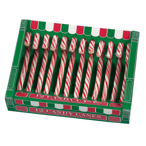 Green box of 12 red and white candy canes from Jag Couture London - New York, each 12.8cm tall, arranged neatly inside the box.