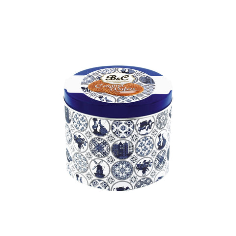 Blue and white tin of caramel wafers from Jag Couture London - New York, shown with the tin open revealing the wafers inside.