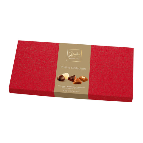 Hamlet Magic Line red flat box of assorted chocolates by Jag Couture London - New York, featuring a variety of decorated chocolate confections.