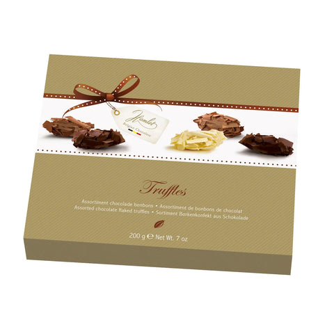 Hamlet milk, white, and dark chocolate flaked truffles in a gift carton by Jag Couture London New York.