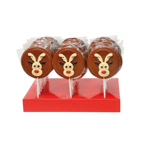 Hand-decorated milk chocolate reindeer lollies from Jag Couture London and New York, featuring festive holiday designs.