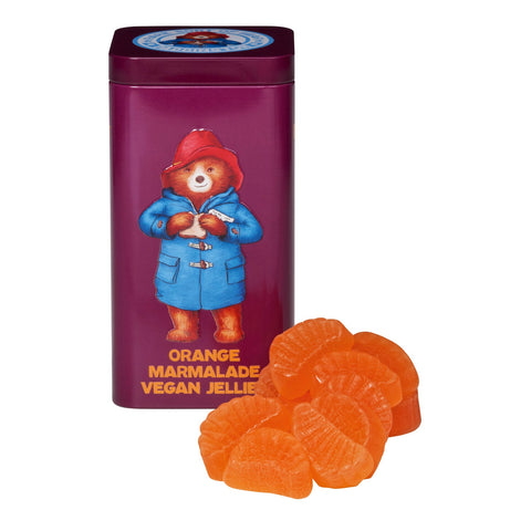 Paddington Bear gift tin with Jag Couture London vegan orange marmalade flavored jellies, featuring colorful bear illustration.