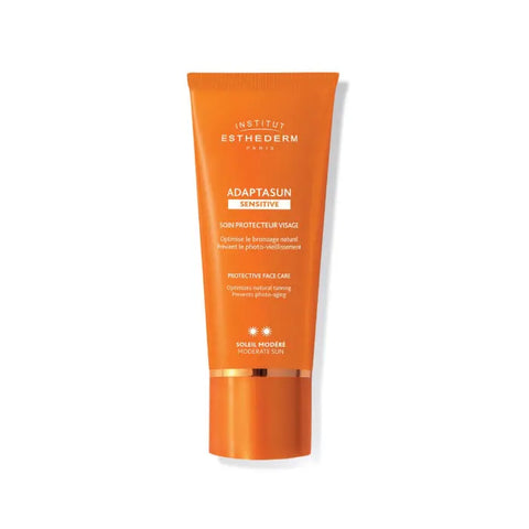 Institut Esthederm Adaptasun Sensitive Face Cream, 50ml, for moderate sun protection, in a white jar with a blue lid.