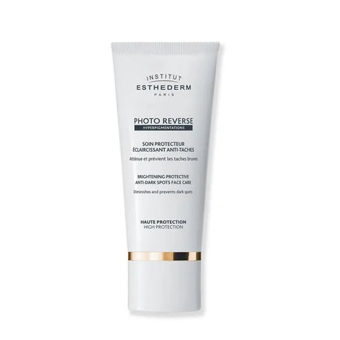Institut Esthederm Photo Reverse anti-dark spots face care 50ml tube with white and silver packaging and product label.