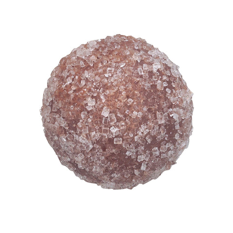Milk chocolate Crème Brûlée truffle by Jag Couture London, featuring creamy filling and smooth milk chocolate coating.
