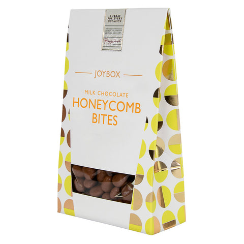 Jag Couture London milk chocolate honeycomb pieces in a carton, coated with smooth milk chocolate for a sweet treat.