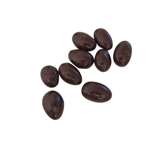 Dark chocolate covered almonds from Jag Couture London - New York, shown in a close-up image highlighting the glossy coating and almond interior.