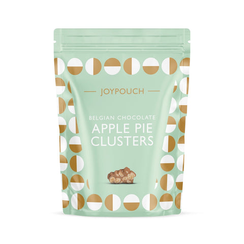 Milk chocolate-covered apple pie clusters by Joypouch from Jag Couture London New York, showcasing glossy chocolate coating on apple pie bites.
