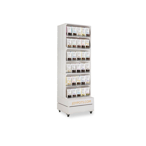 Jag Couture London wooden display stand for jewelry or accessories, showcasing a sleek, natural wooden design.